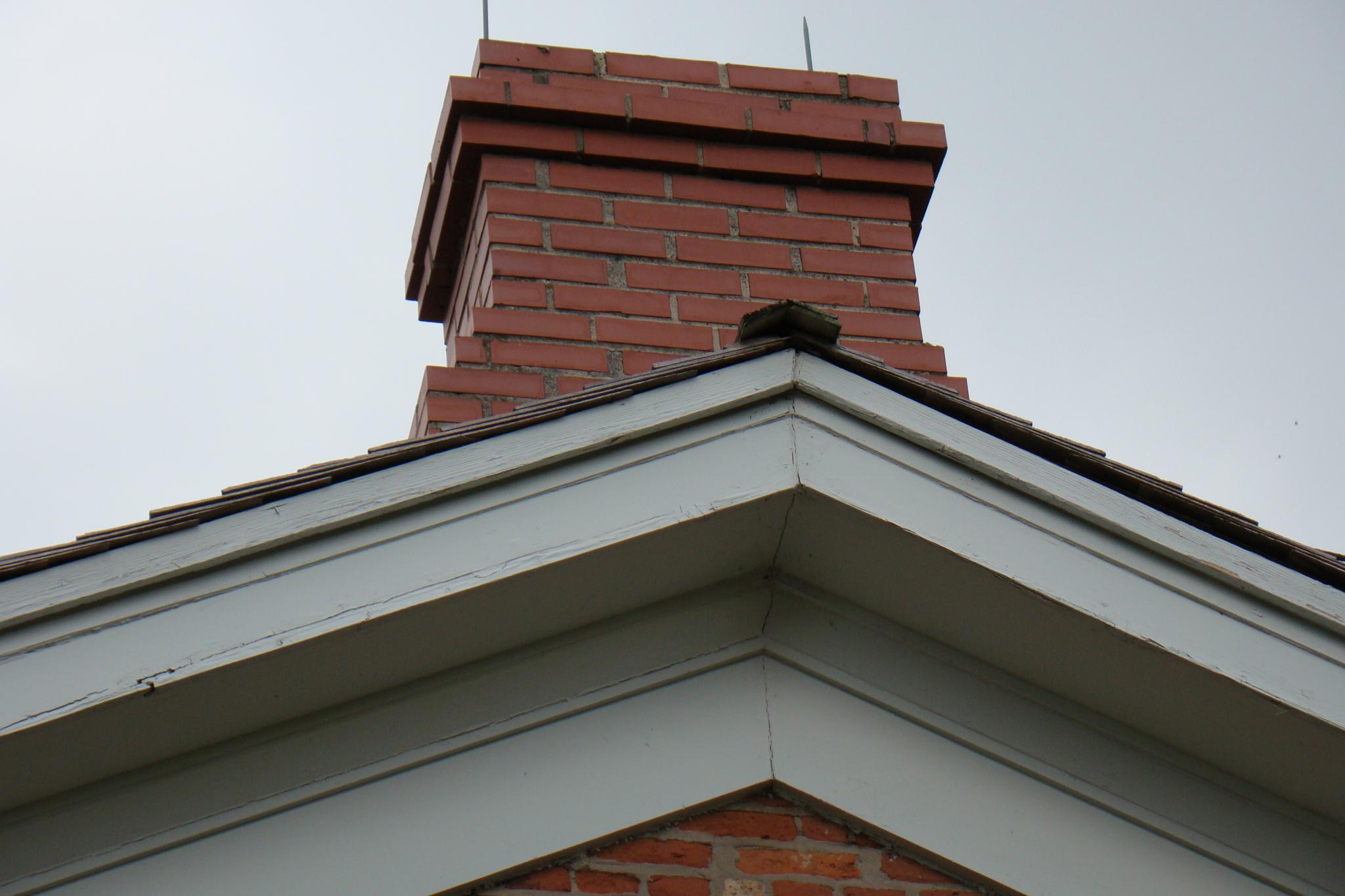 Wide trim on gable end of Halfway House