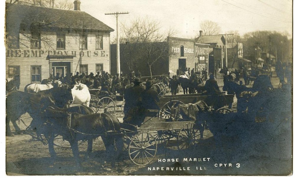 Picture postcard of Naperville's Market Days, postmarked 1909, crowded with horses and wagons