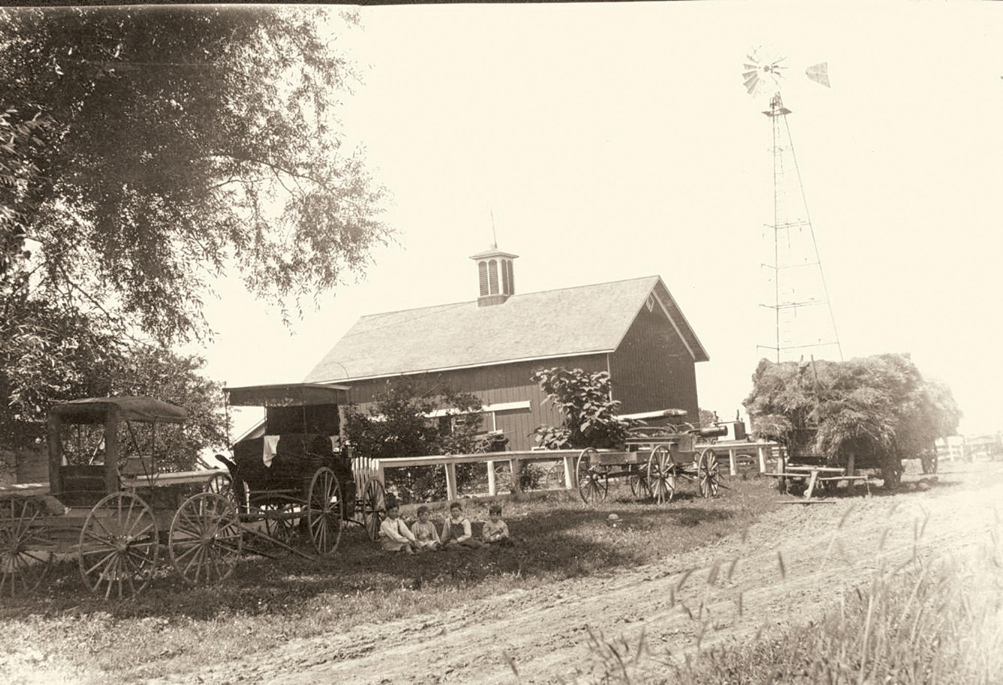 Naperville farm with windmill, late nineteenth century
